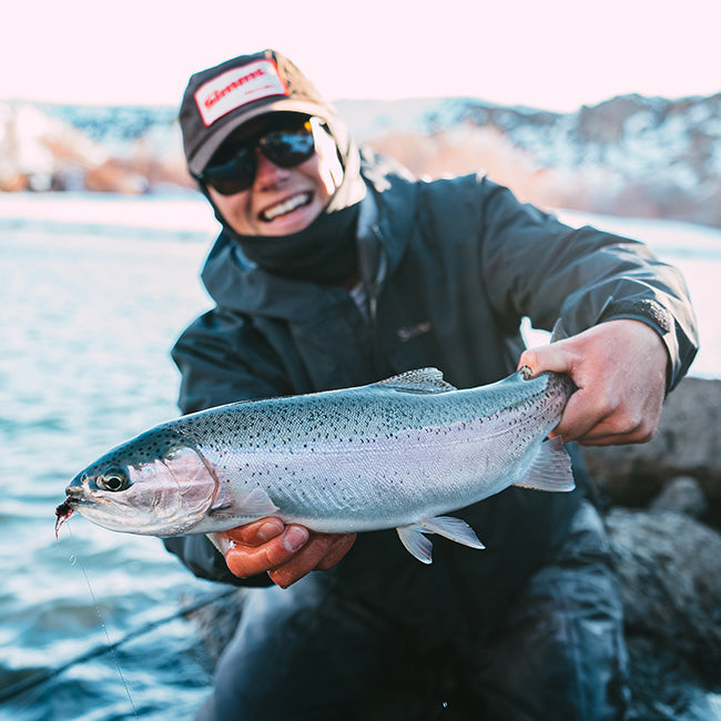 Joseph Evans fishing in a river